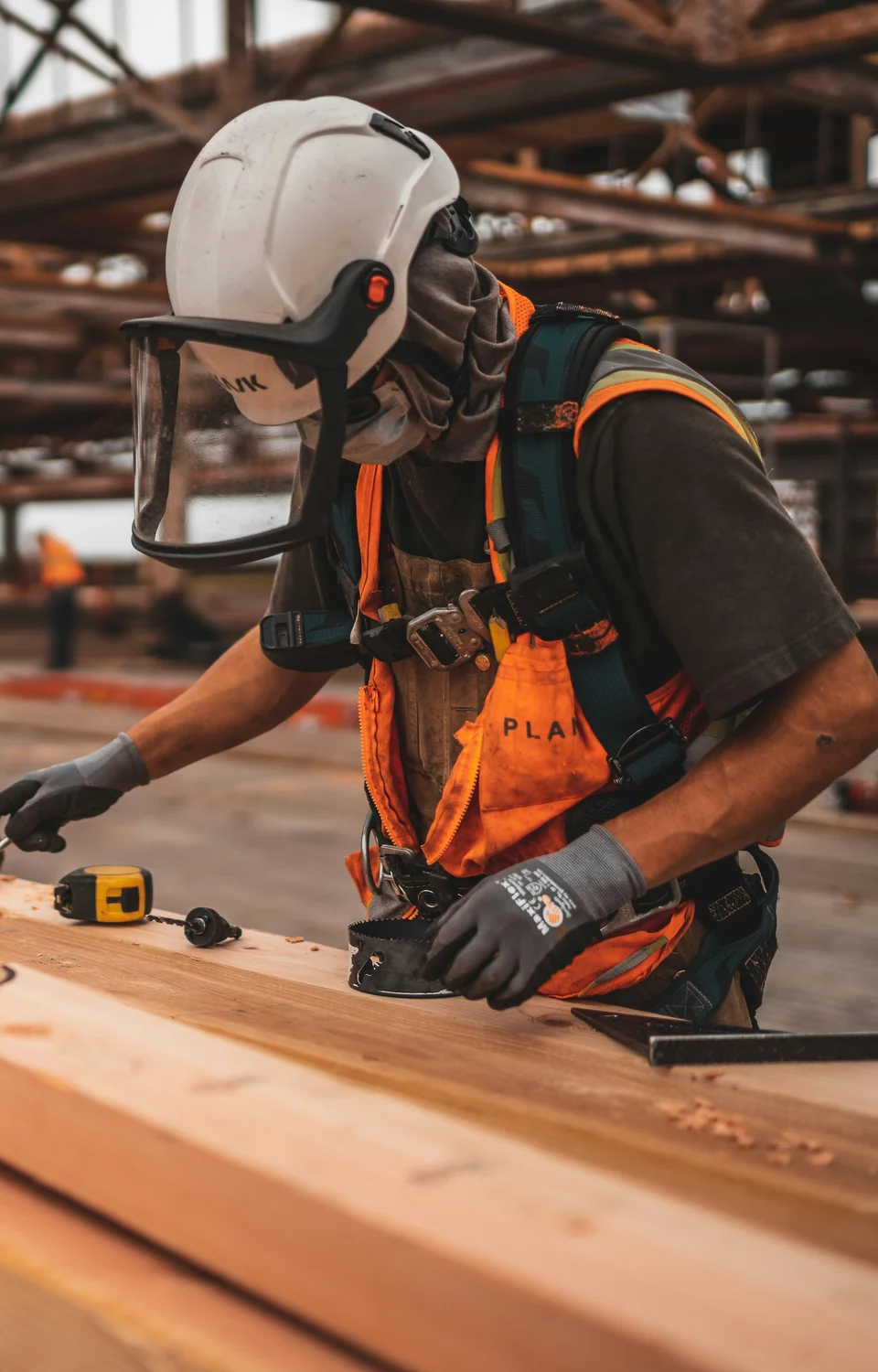 Construction carpenter working with UNSEEN device