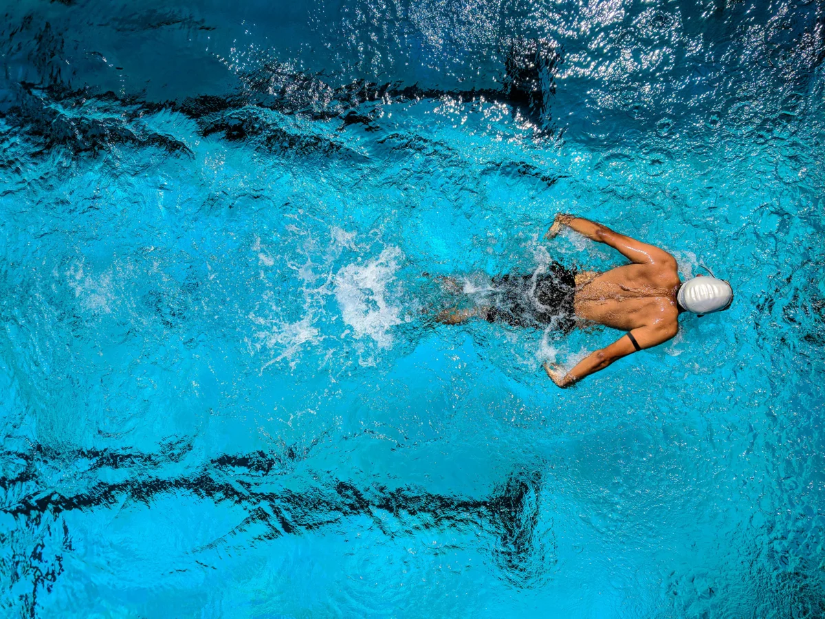 Swimmer in pool showing waterproof capability